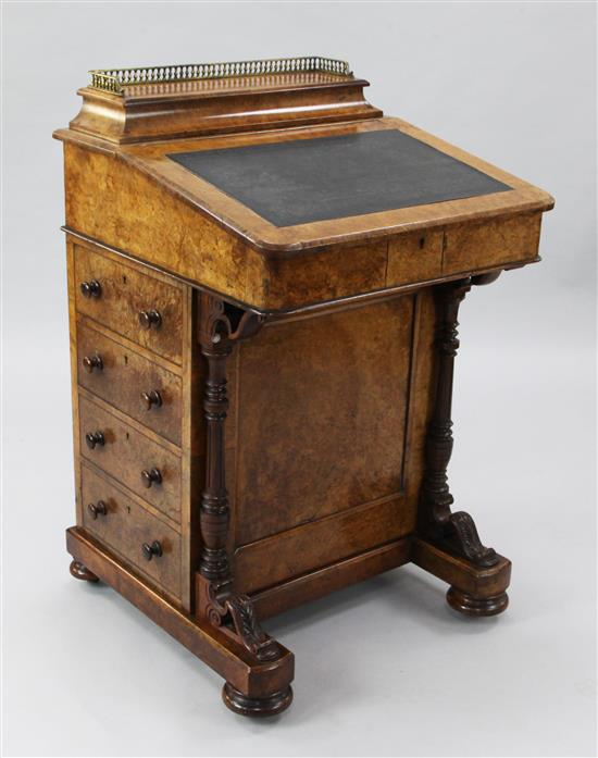 A Victorian figured walnut davenport, W.1ft 10in. D.1ft 10in. H.3ft